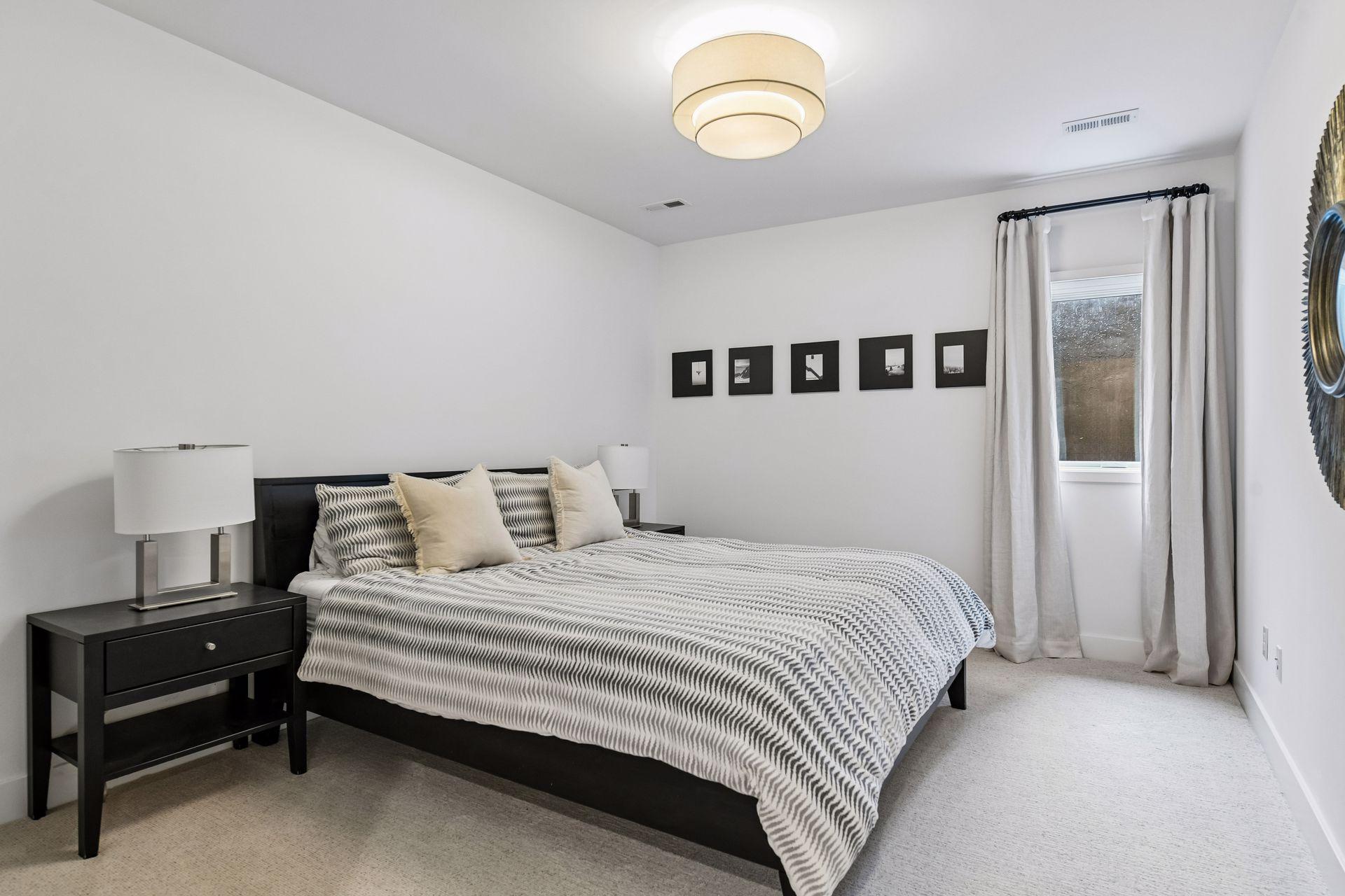 A basement bedroom perfect for a guest room or family member requiring extra privacy.
