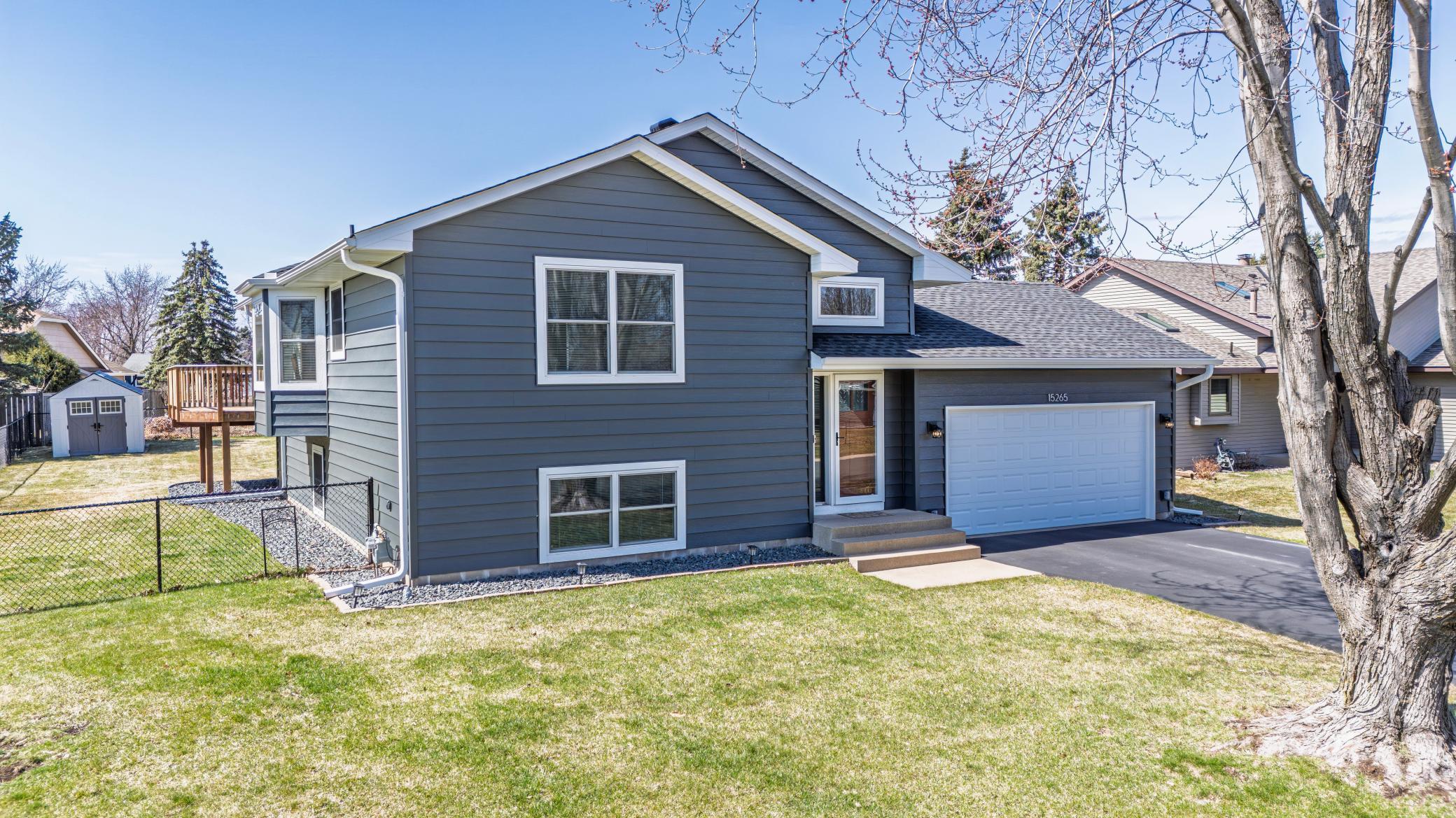 New steel siding, windows, and garage door.