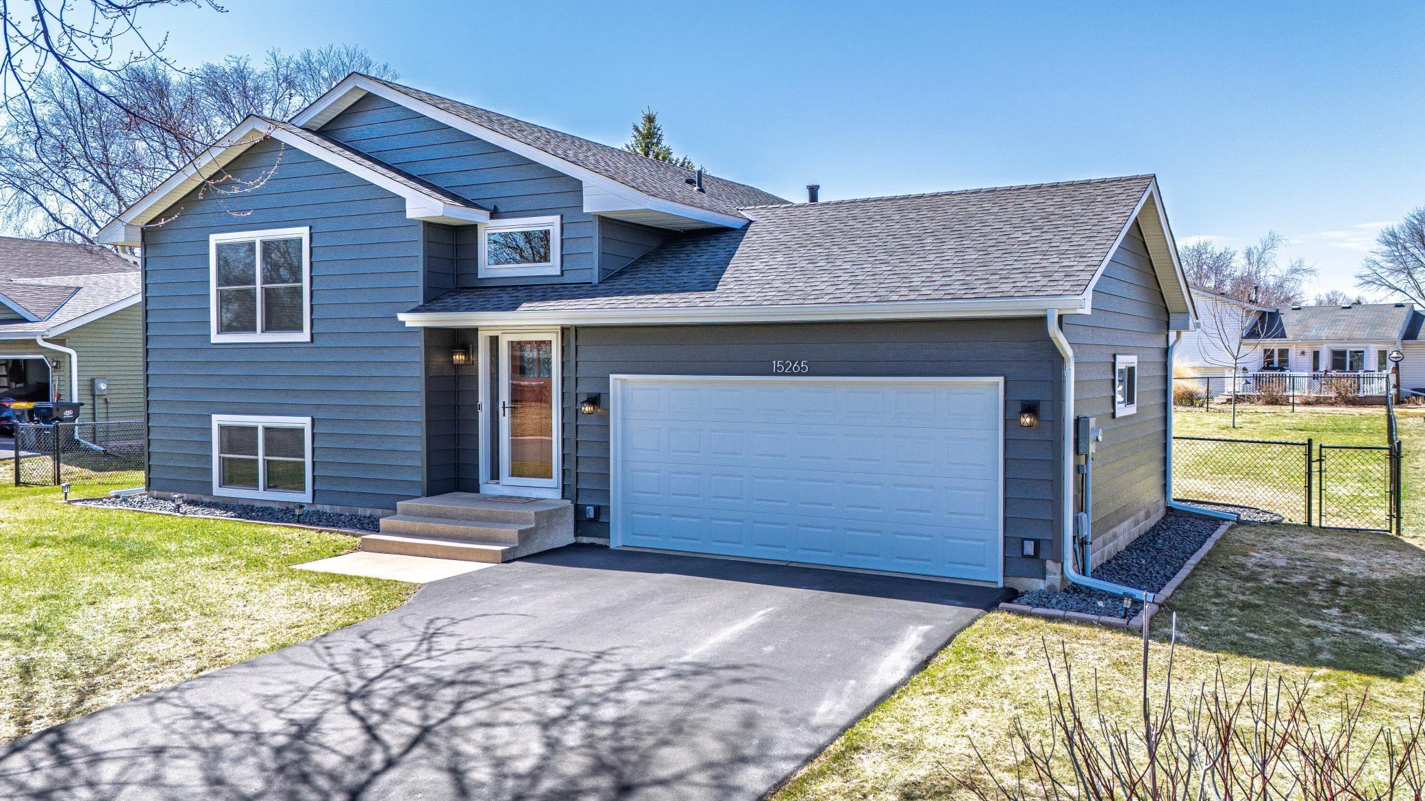 Newer asphalt driveway and recently sealed.