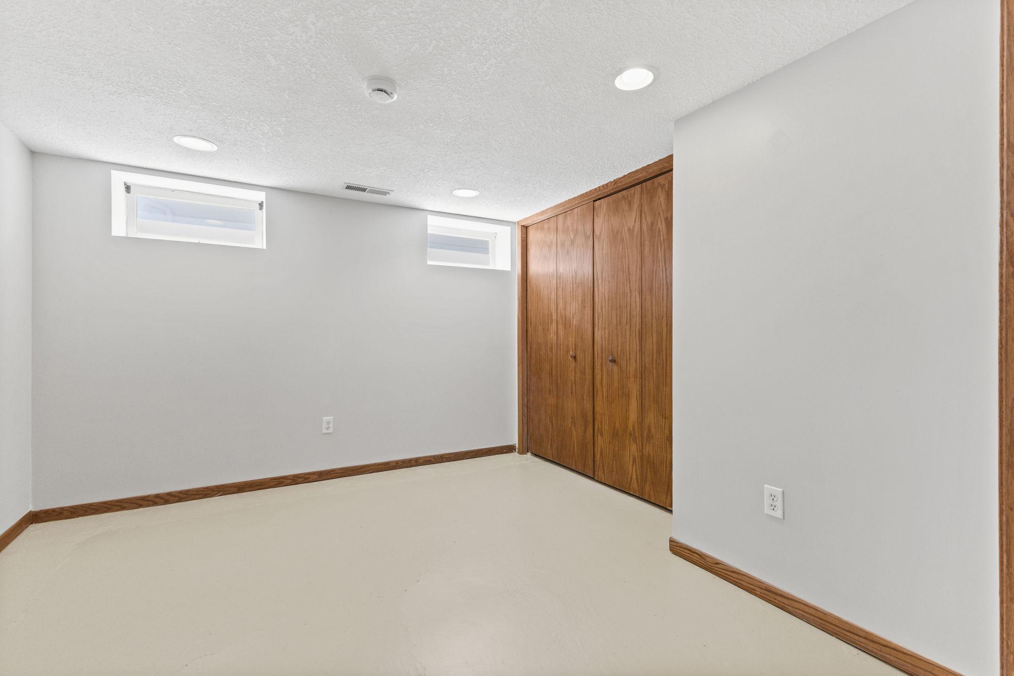 Additional lower level room ideal for storage, office, or flex use