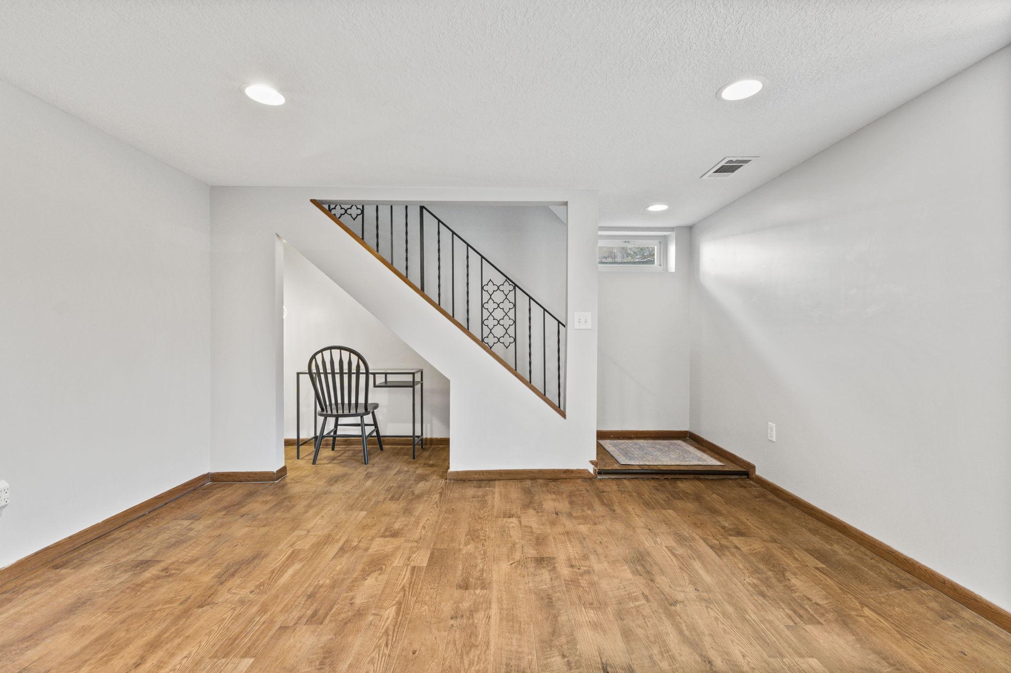 Lower level space with open layout—perfect for recreation, workout area, or additional living.