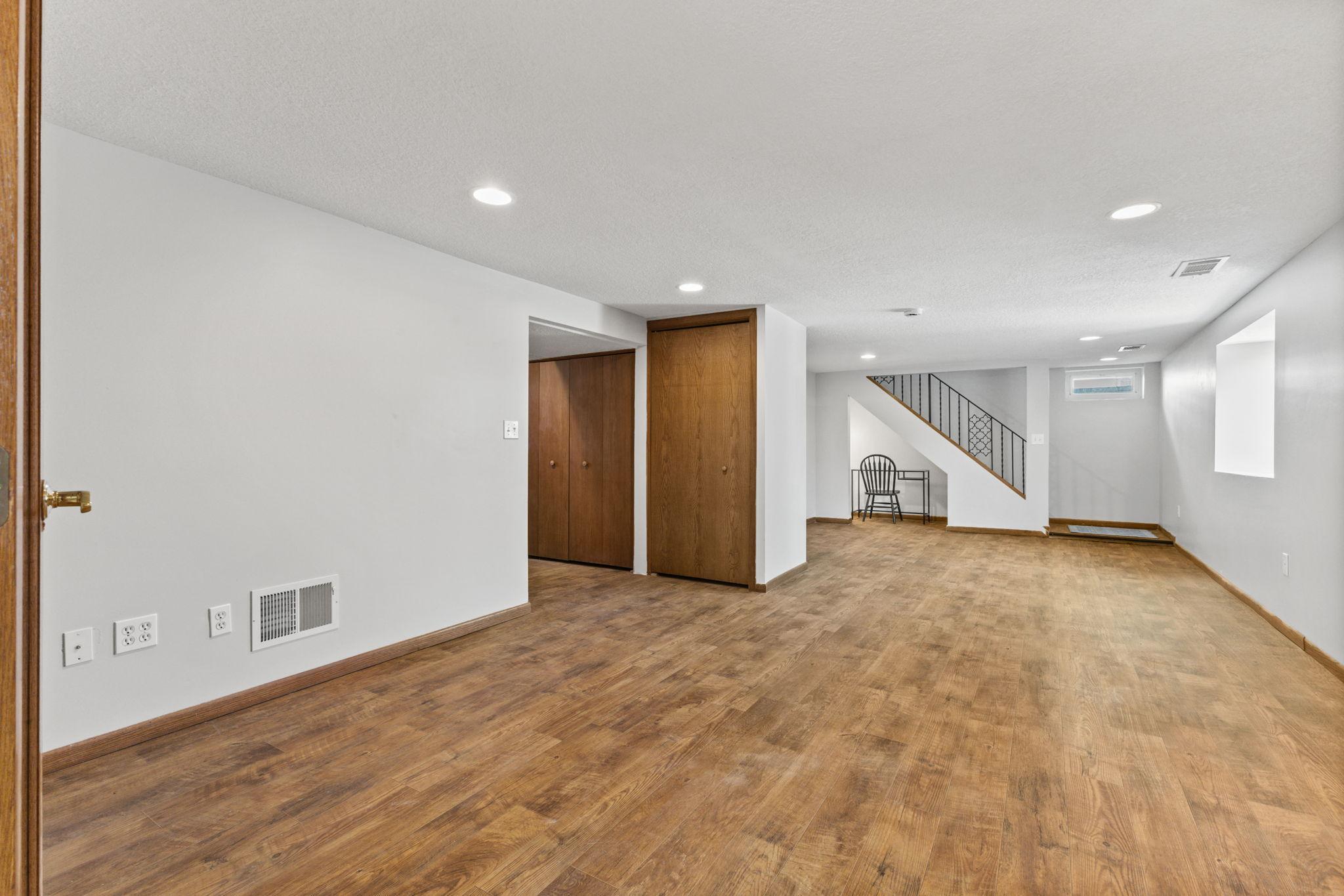 Open lower level space with clean finishes and room to customize
