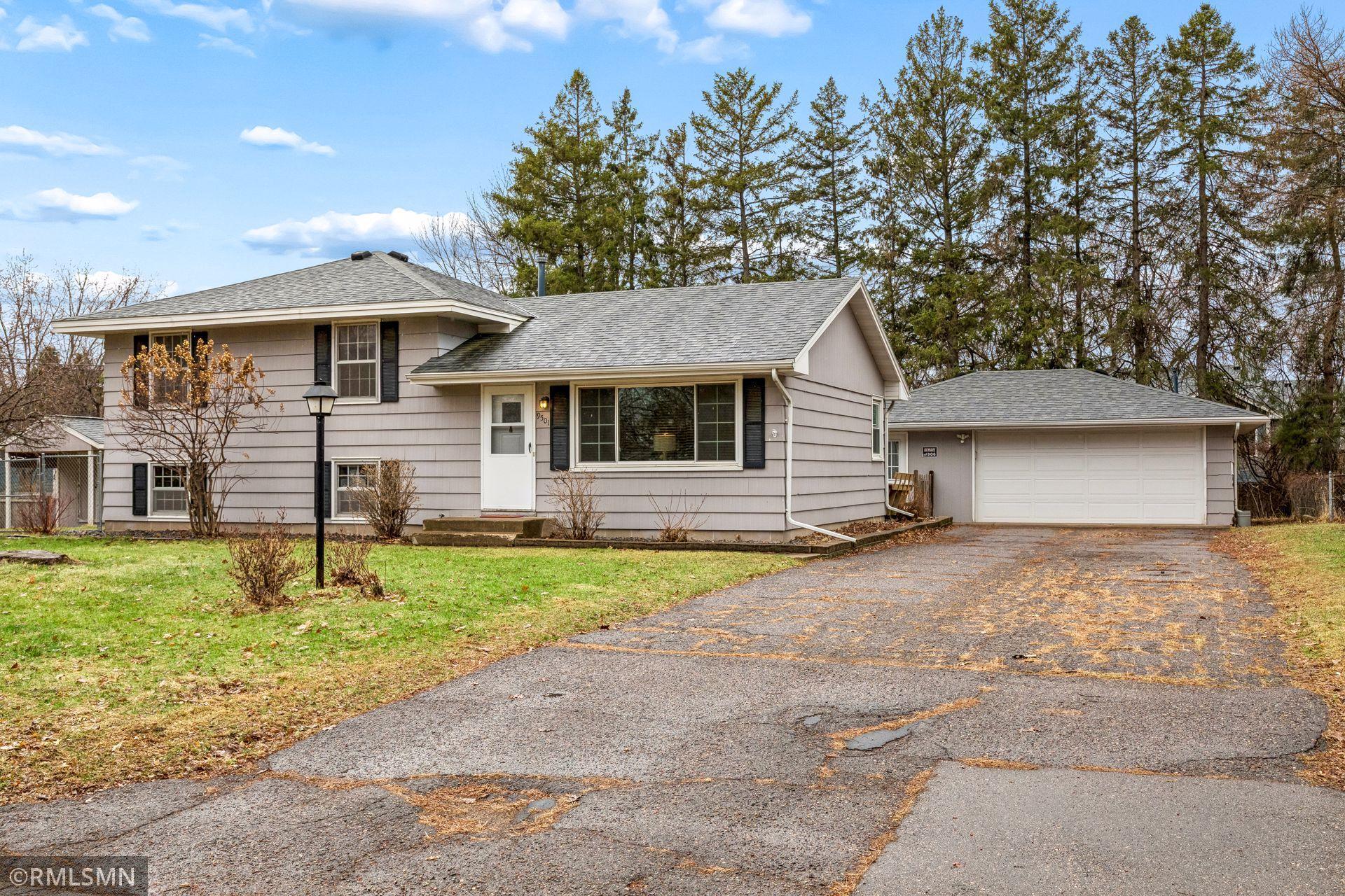 Large 2 car garage w/attached woodshop.