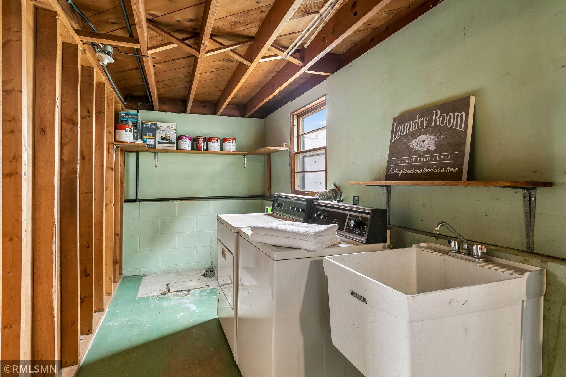 Laundry w/storage area, new water heater ('26) & additional toilet