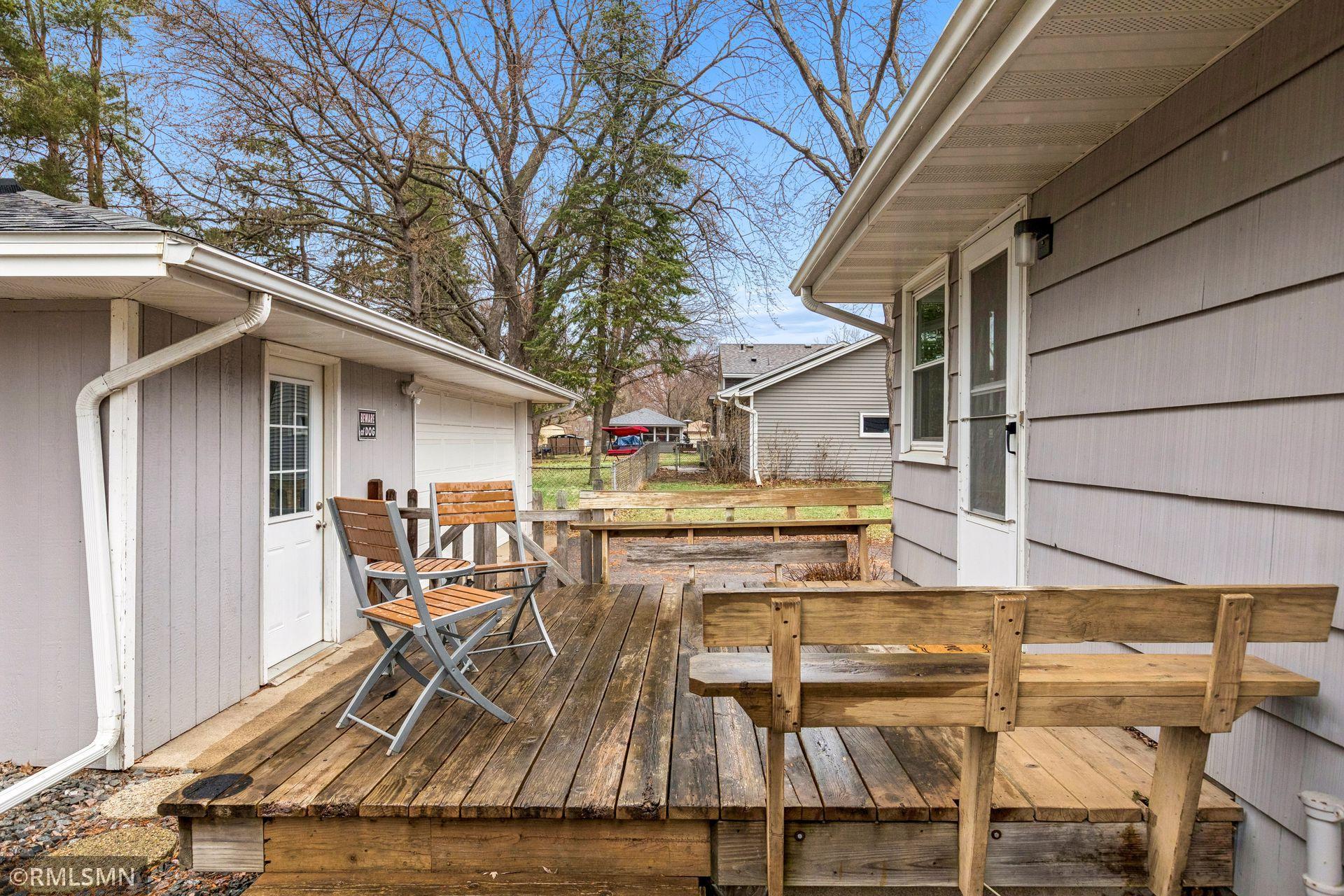 Deck connects house and garage