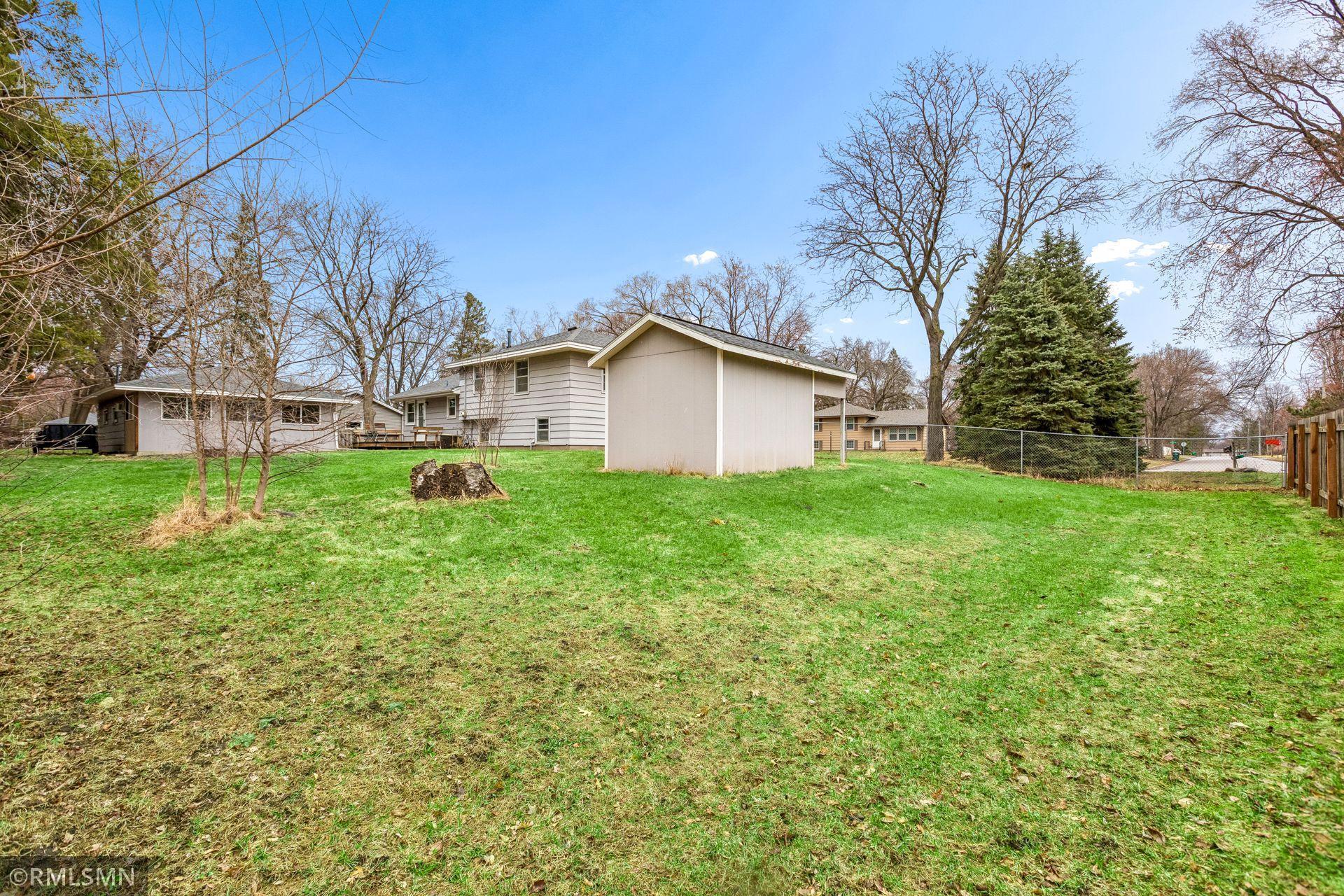 HUGE! FULLY FENCED! FLAT BACKYARD!