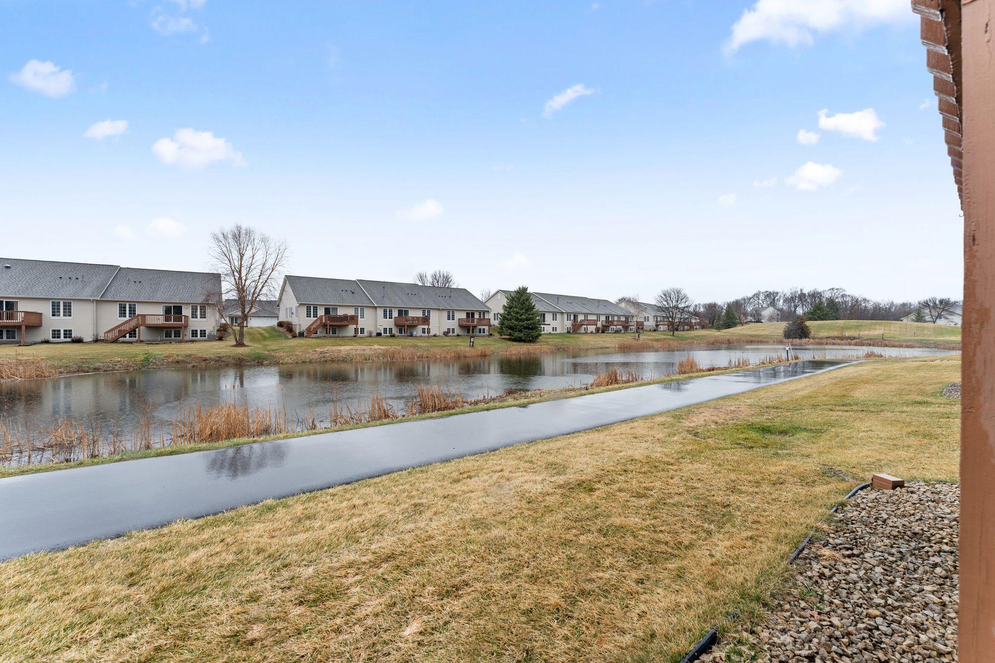 Peaceful views of the pond and walking trails, just steps from the backyard!