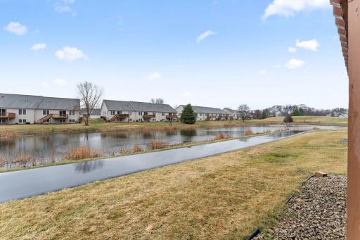 Peaceful views of the pond and walking trails, just steps from the backyard!
