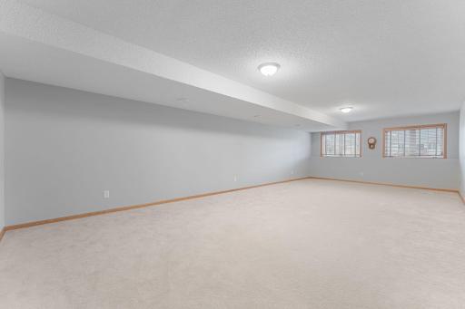 This family room provides extra space for entertaining family and guests, or your favorite hobbies.