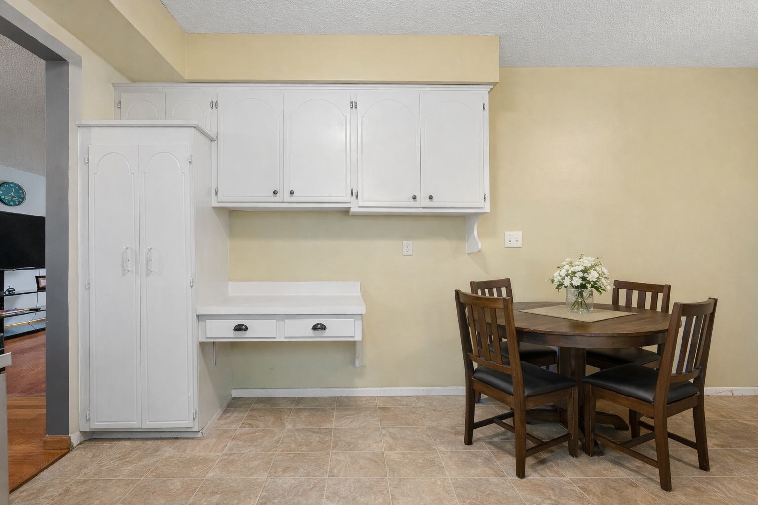 Cozy kitchen nook with dining table.png