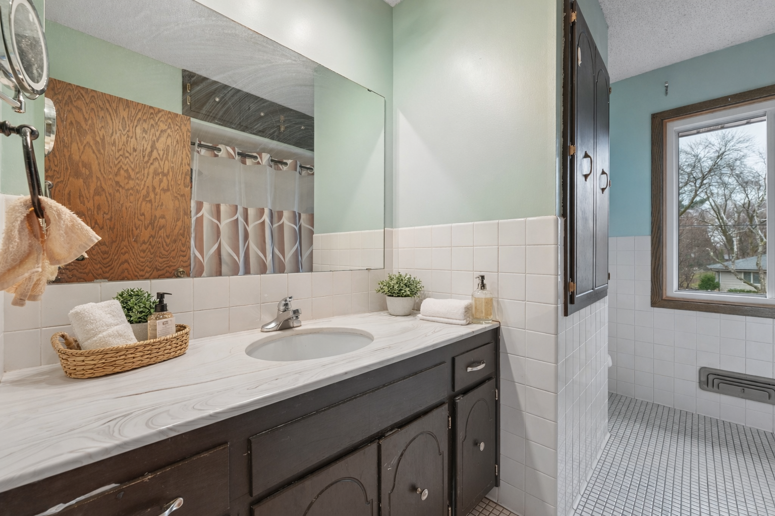 Elegant mint green bathroom layout.png