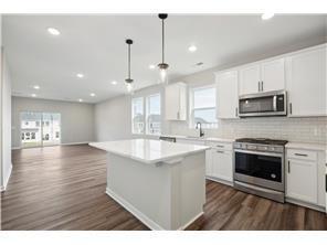 Photos are of a previously built home. Finishes will vary.