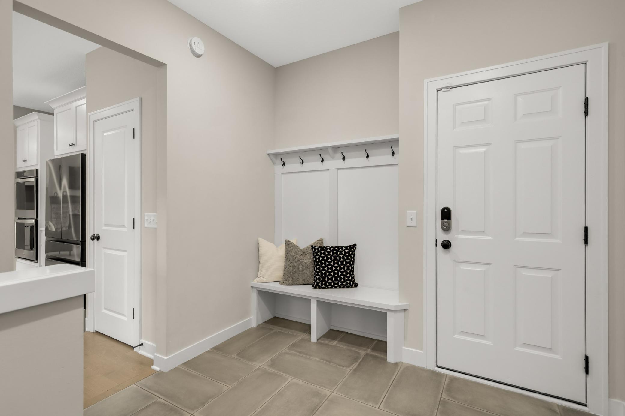 Convenient Oversized Mudroom with Closet