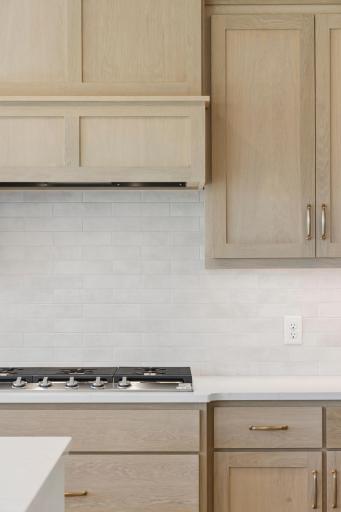 Beautiful ceramic tile backsplash (photo of actual listing).