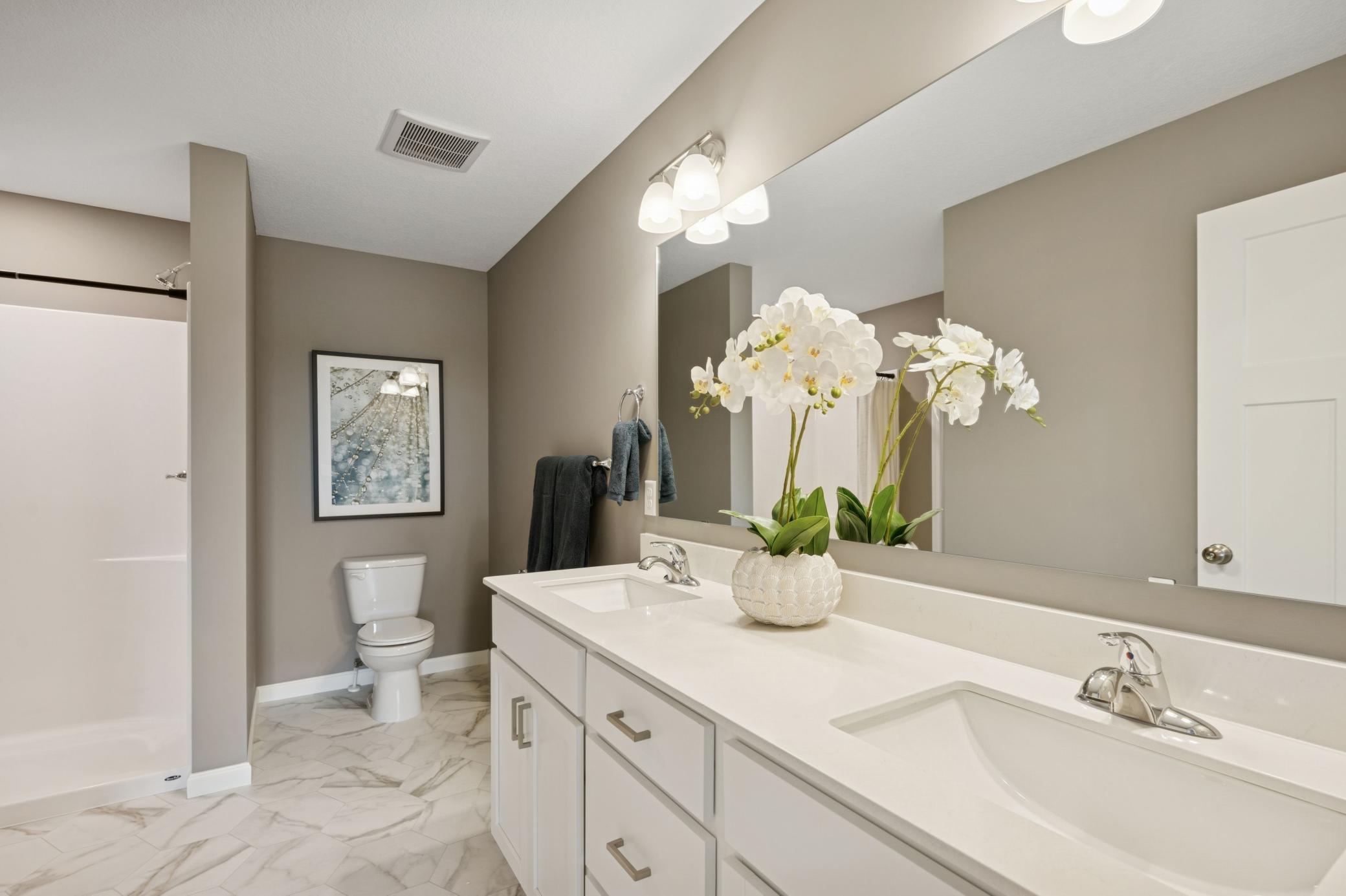 Primary bath - photo is of model home for illustrative purposes