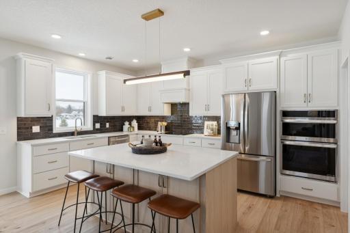 Photo taken from previous model with a similar floorplan. While similar, some options shown in the picture may not be included in this pricing. Please ask for a detailed list of included features for this listing.