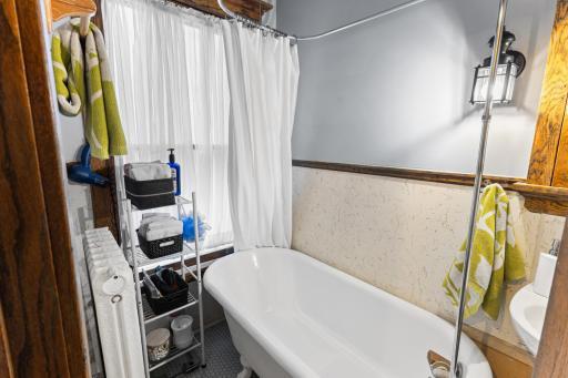 Bathroom with claw foot tub.