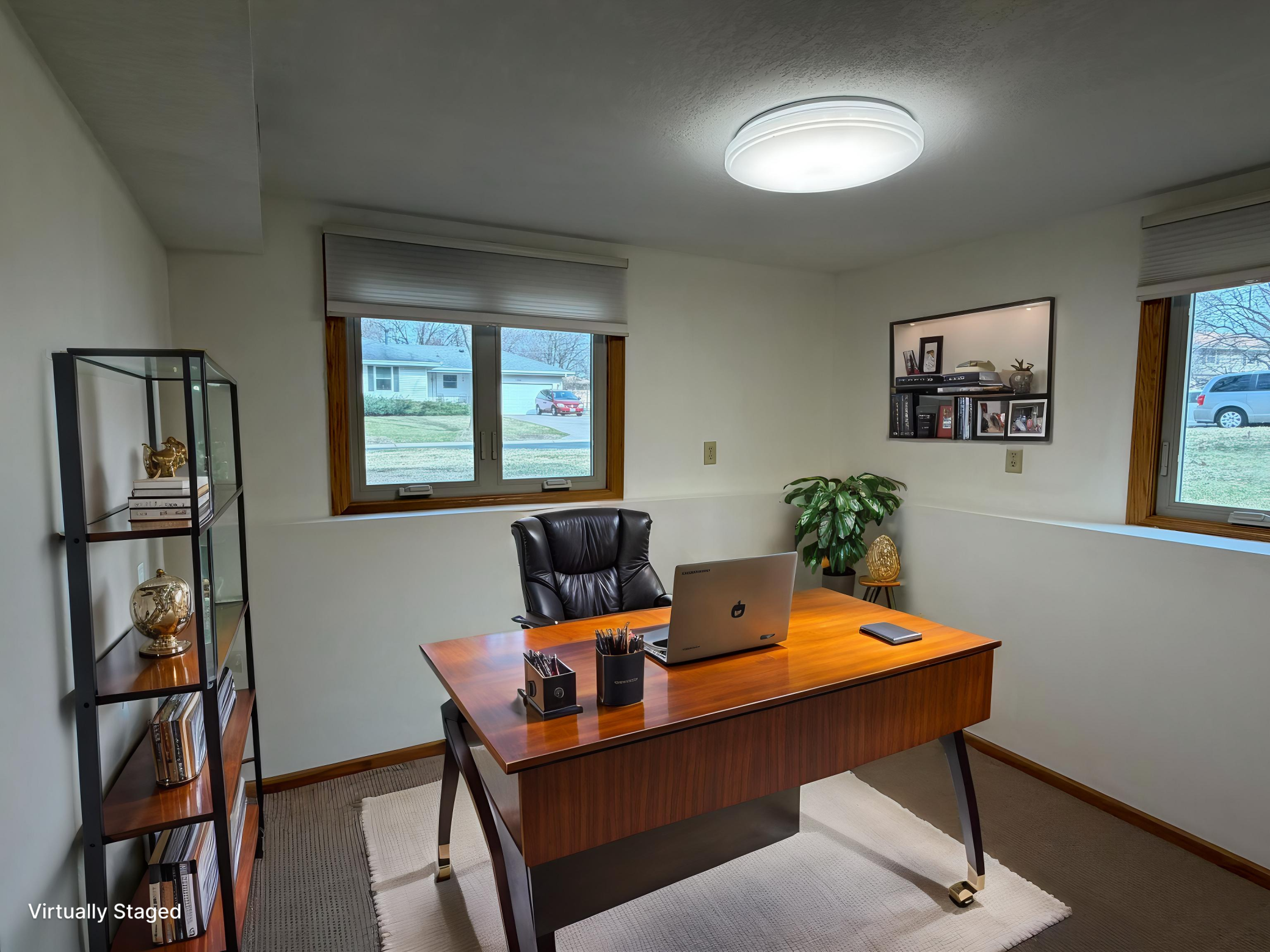 Virtually staged 4th bedroom as an office.