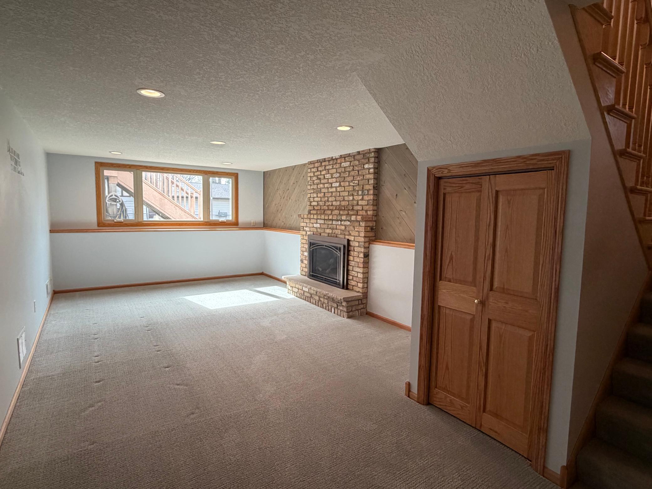 Recessed lighting, daylight windows and a nice gas brick fireplace. The lower level has Dricore subfloor to insulate, protect and cushion the floor in family room and 1 br down.