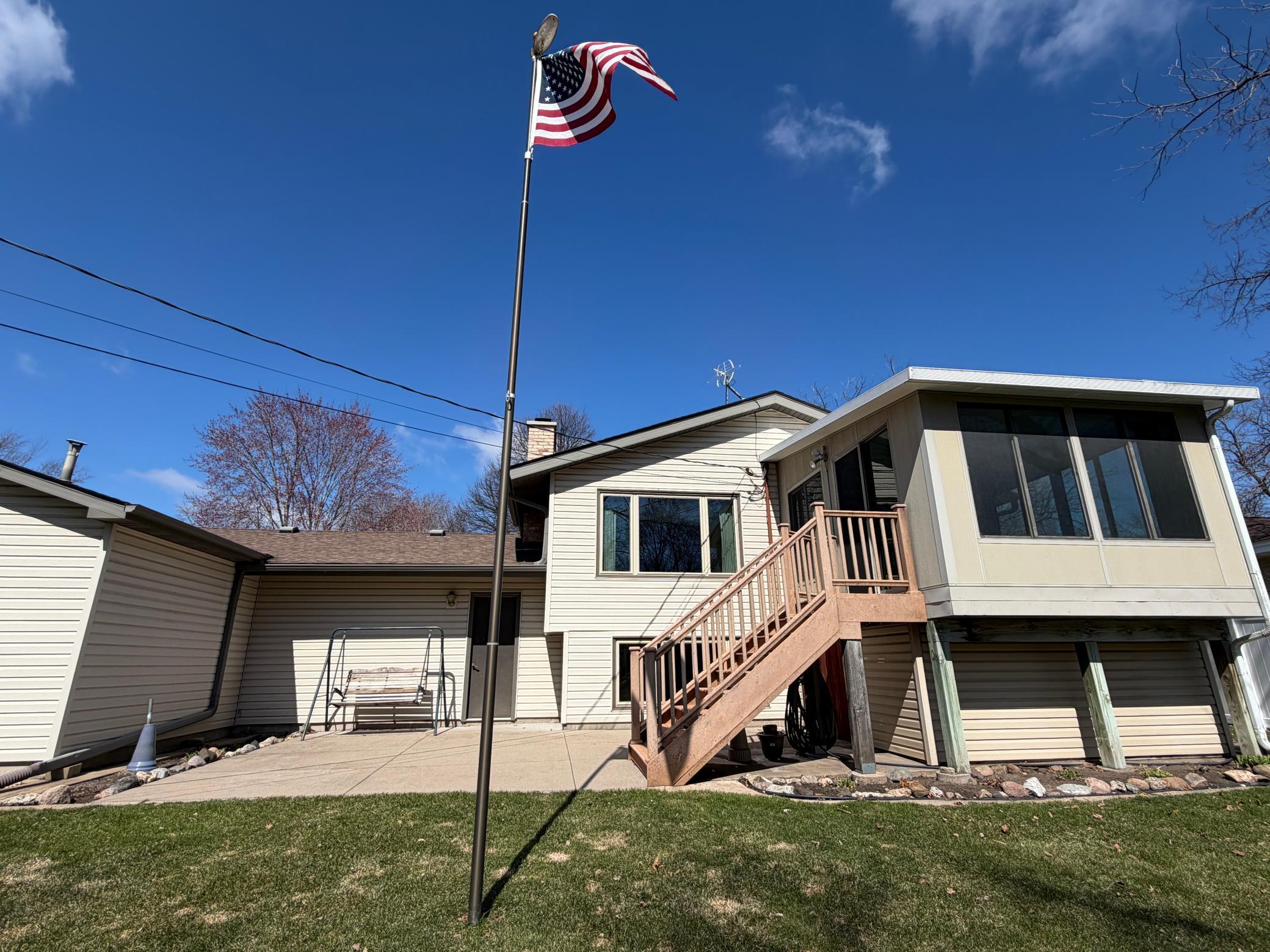 Large patio off the 3-season porch. There's also enclosed storage under the 3-season porch.