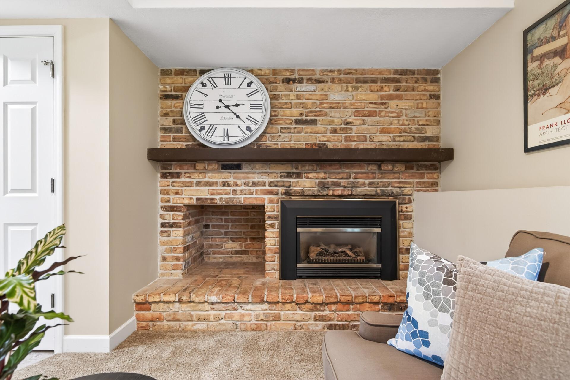 Lower level features gas fireplace