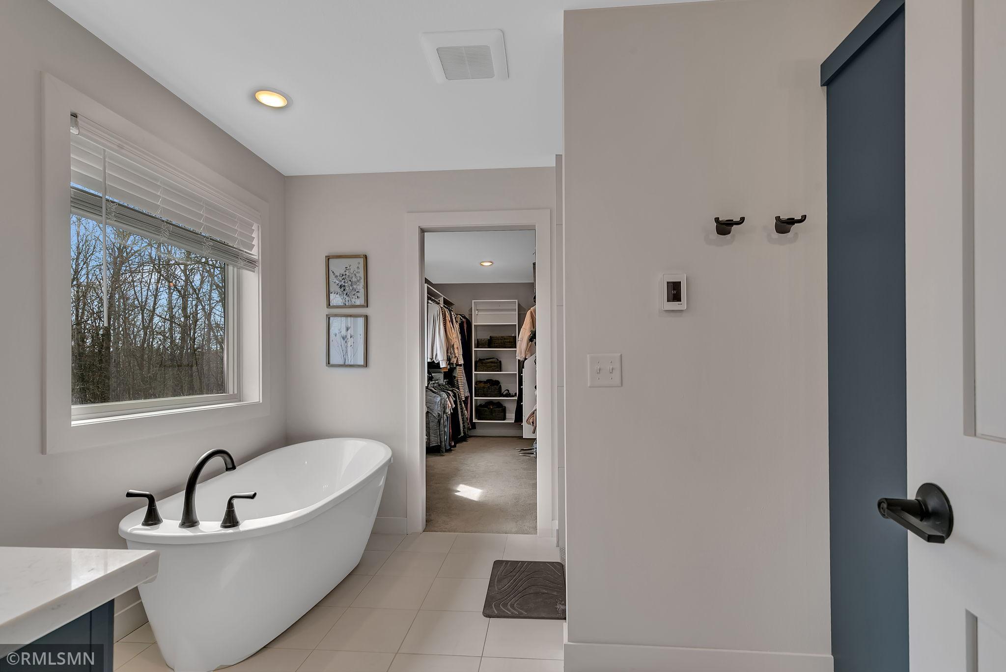 Relax in the freestanding soaking tub