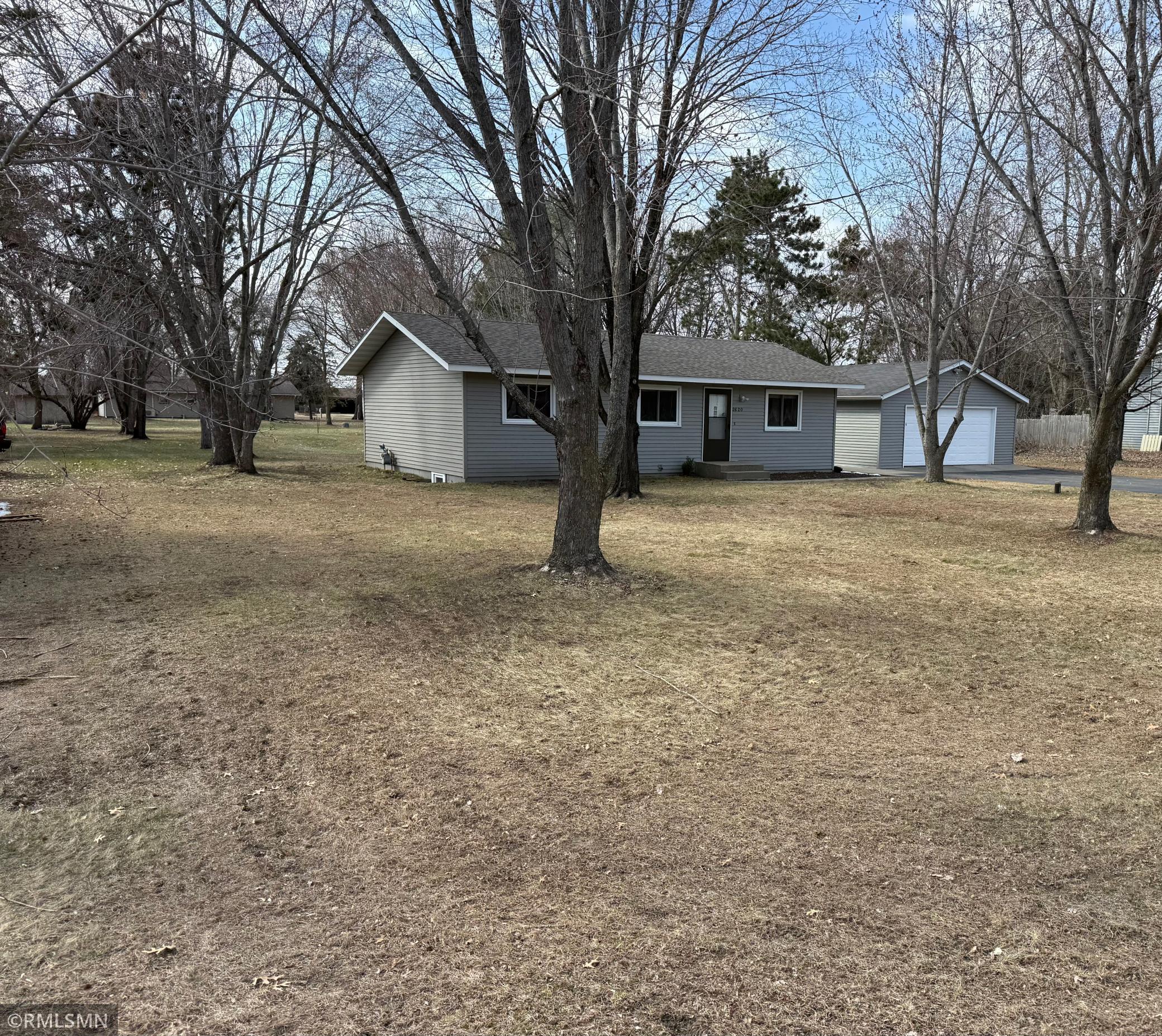 large mature trees in the front yard
