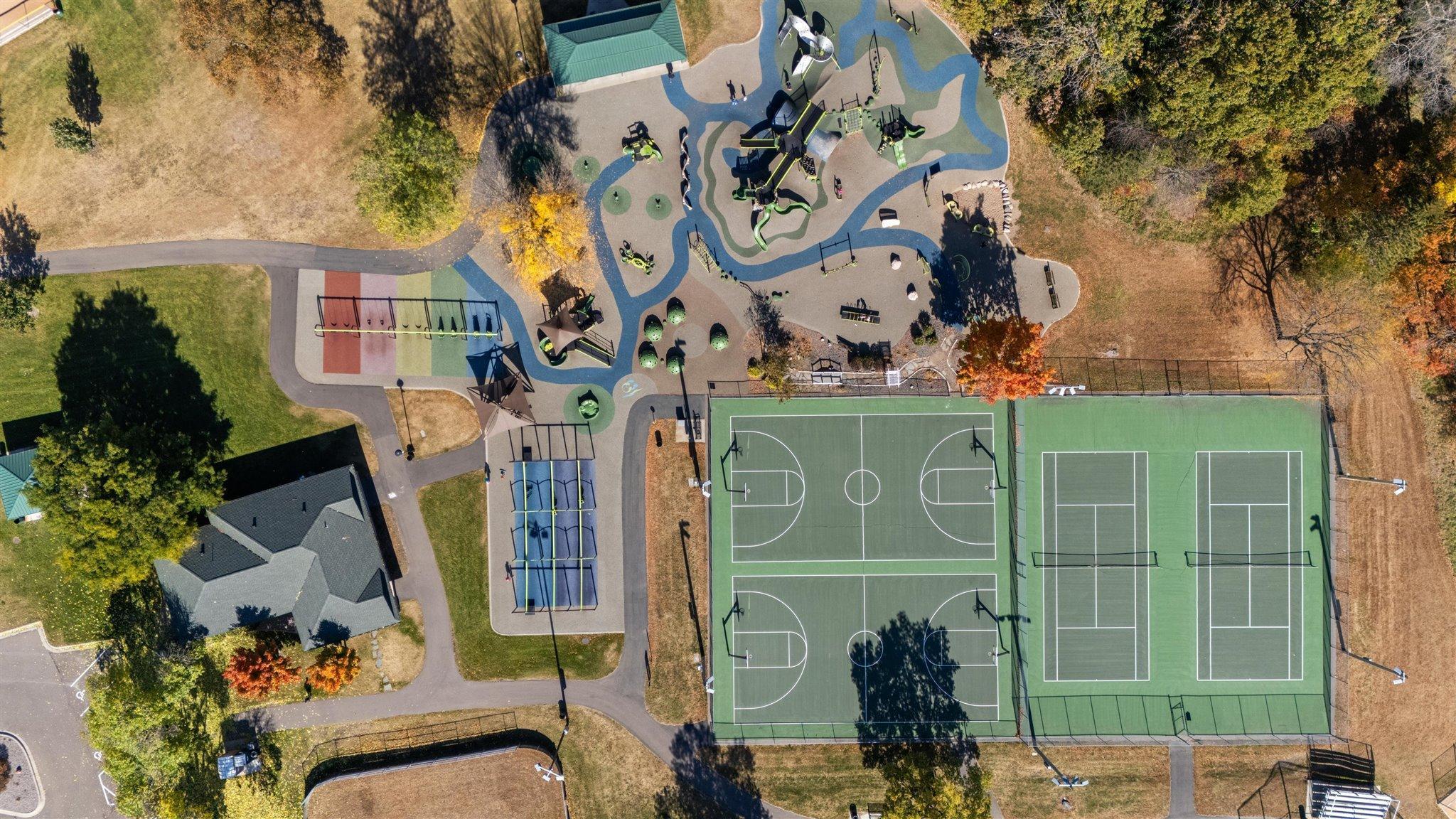Woodridge Park features paved and natural trails, a pond, baseball/softball fields, an ice skating rink, a sand volleyball court, tennis and basketball courts, a sledding hill, and a 23,000 square foot park.