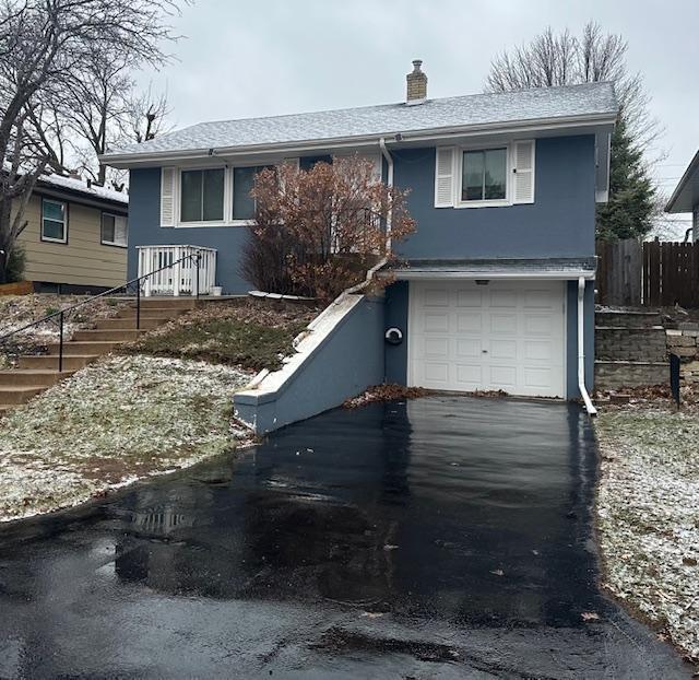 Photo of Front of Home with 1 car tuck-under garage