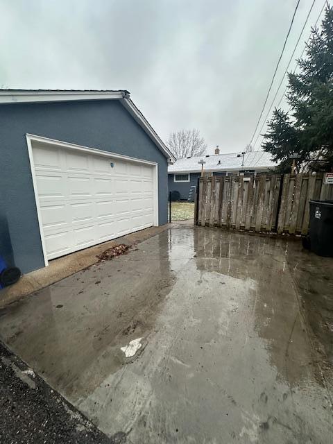 Concrete driveway to 16x20 garage off of ally way