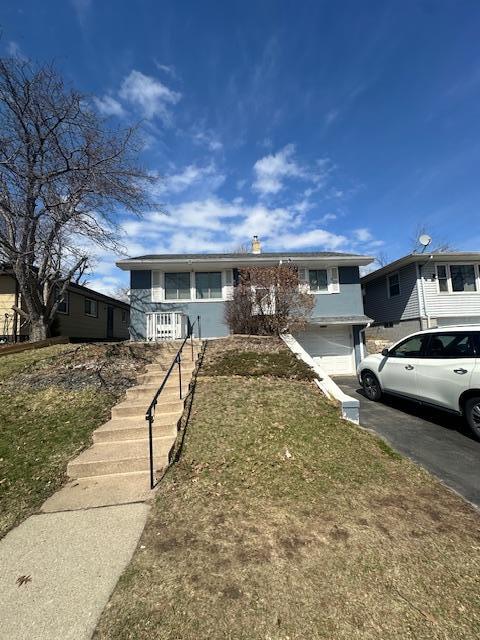 Photo of Front of Home with 1 car tuck-under garage