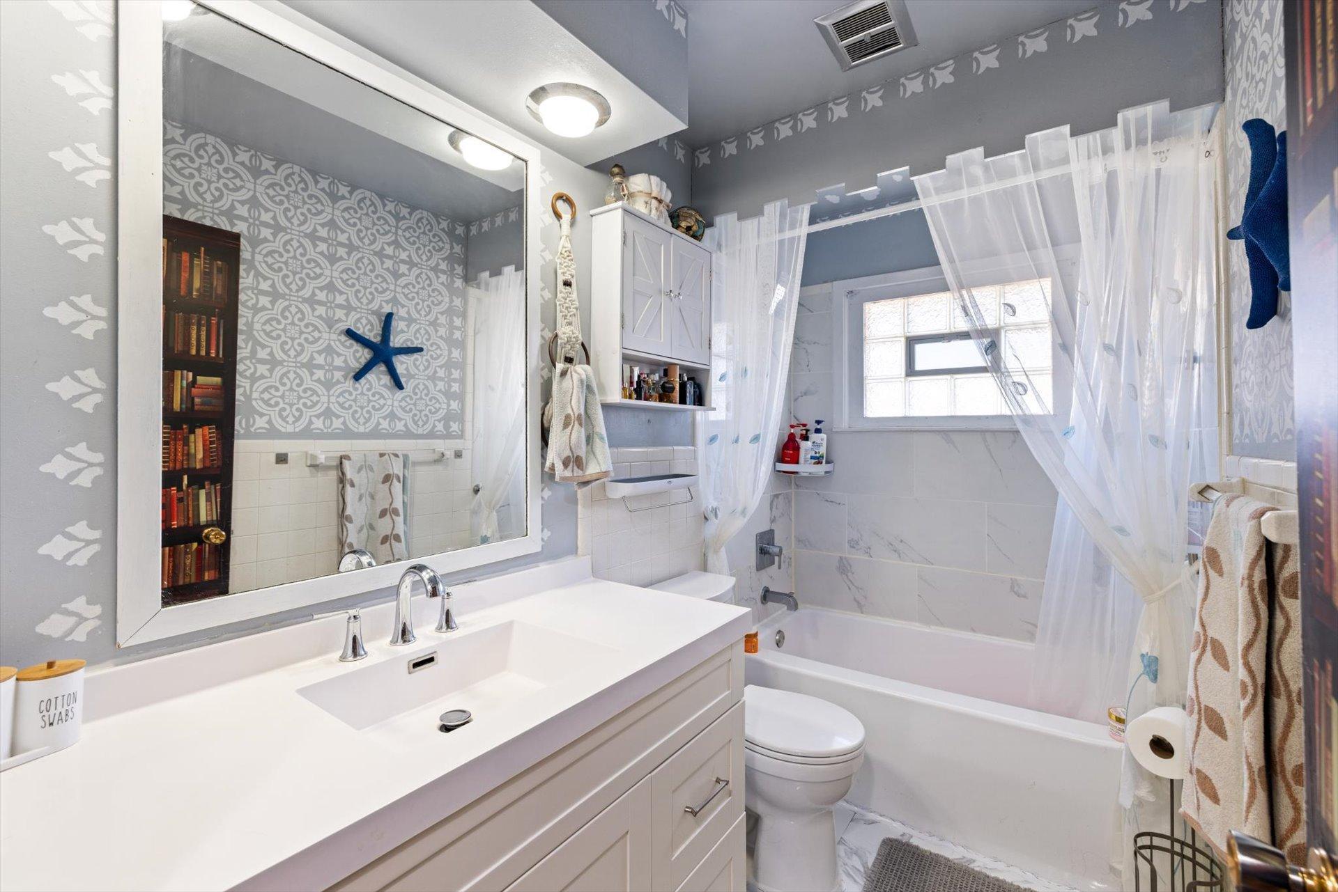 Renovated full bathroom on upper level