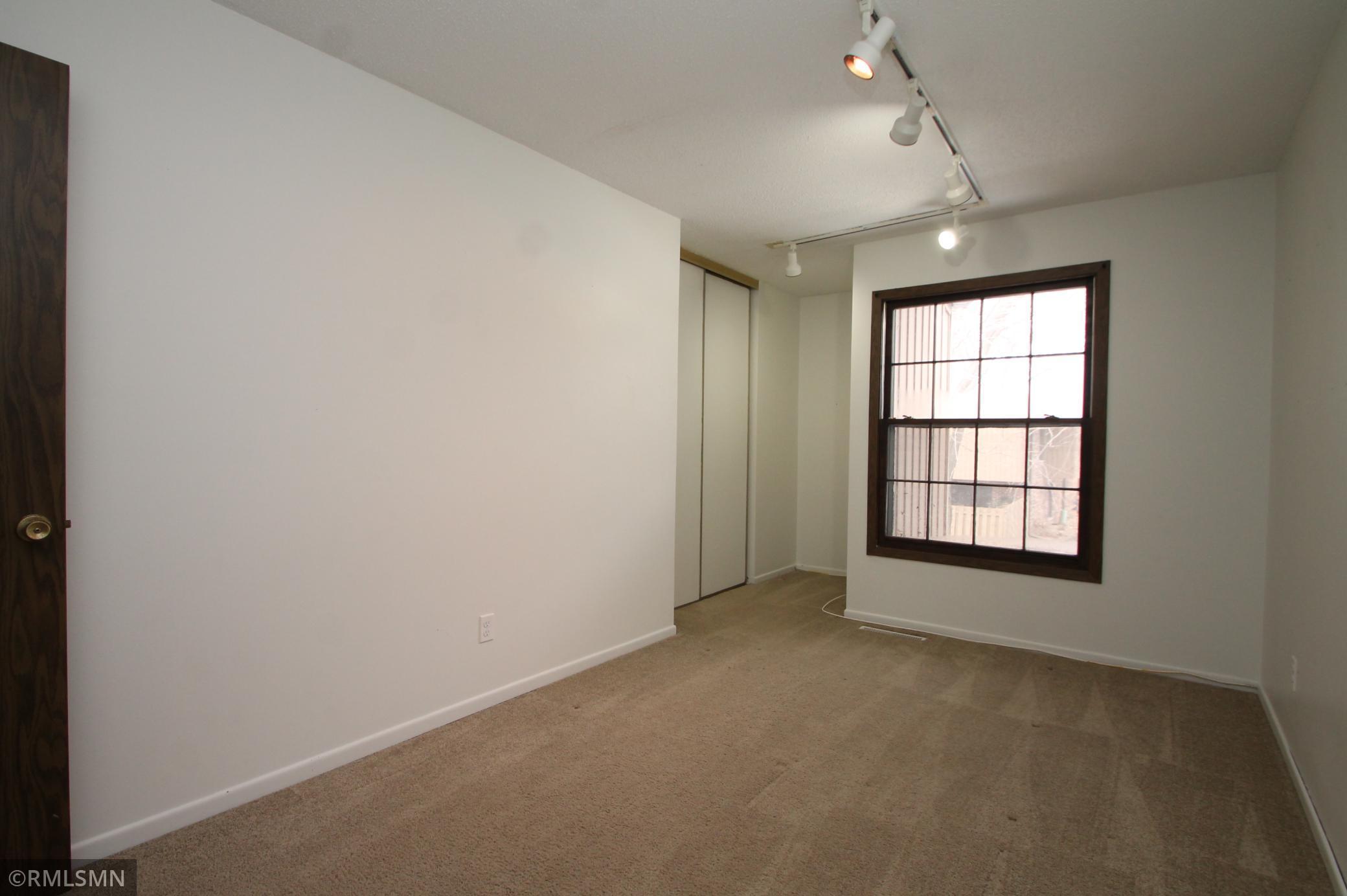 Bedroom 2. Large closet and nook is perfect for a dresser.