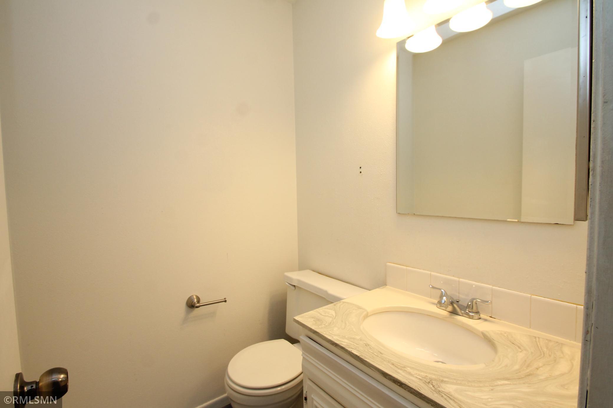 1/2 bath in primary bedroom.