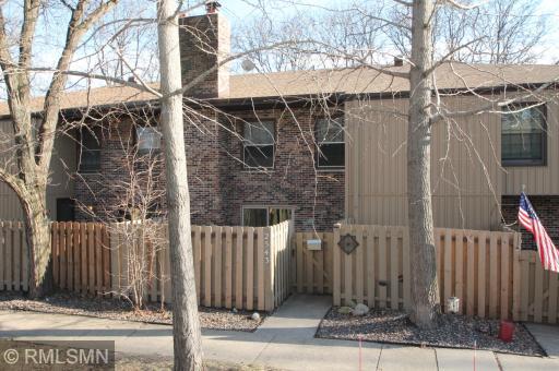An attractive brick and wood exterior welcome you to this home.