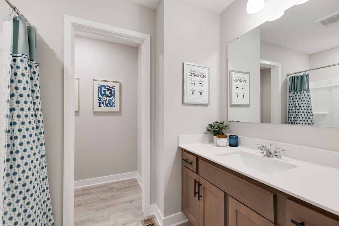 Upper level bath. *Photos used are of a previous model for purposes of close representation.