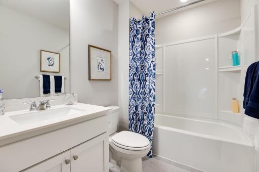 The secondary bathroom on the upper level is an added convenience!