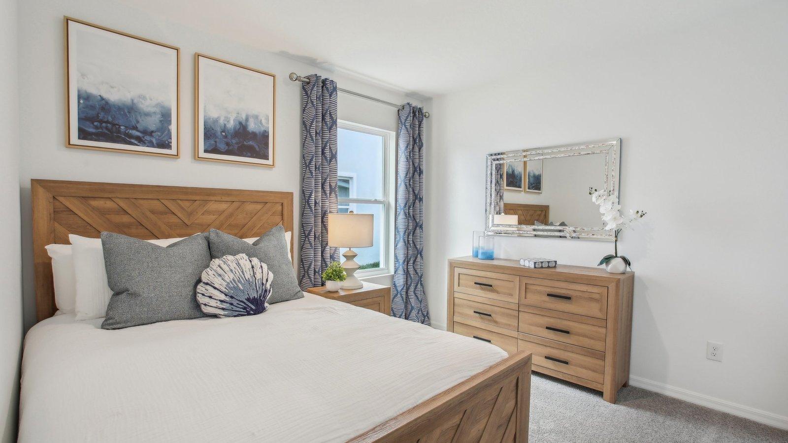 One of three additional main floor bedrooms.