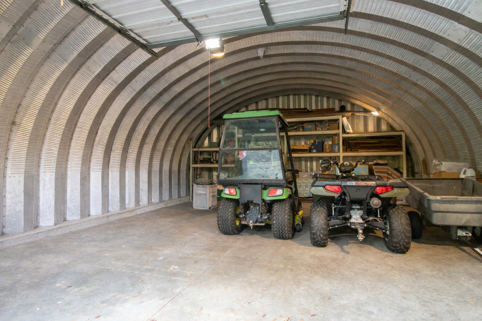 Spacious 1,224 sq ft outbuilding with concrete floor, ideal for storage, hobbies, or setting up a machine shop.