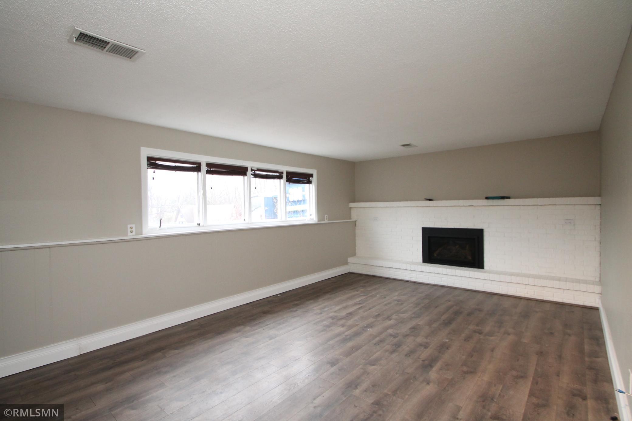 Family room with gas fireplace.
