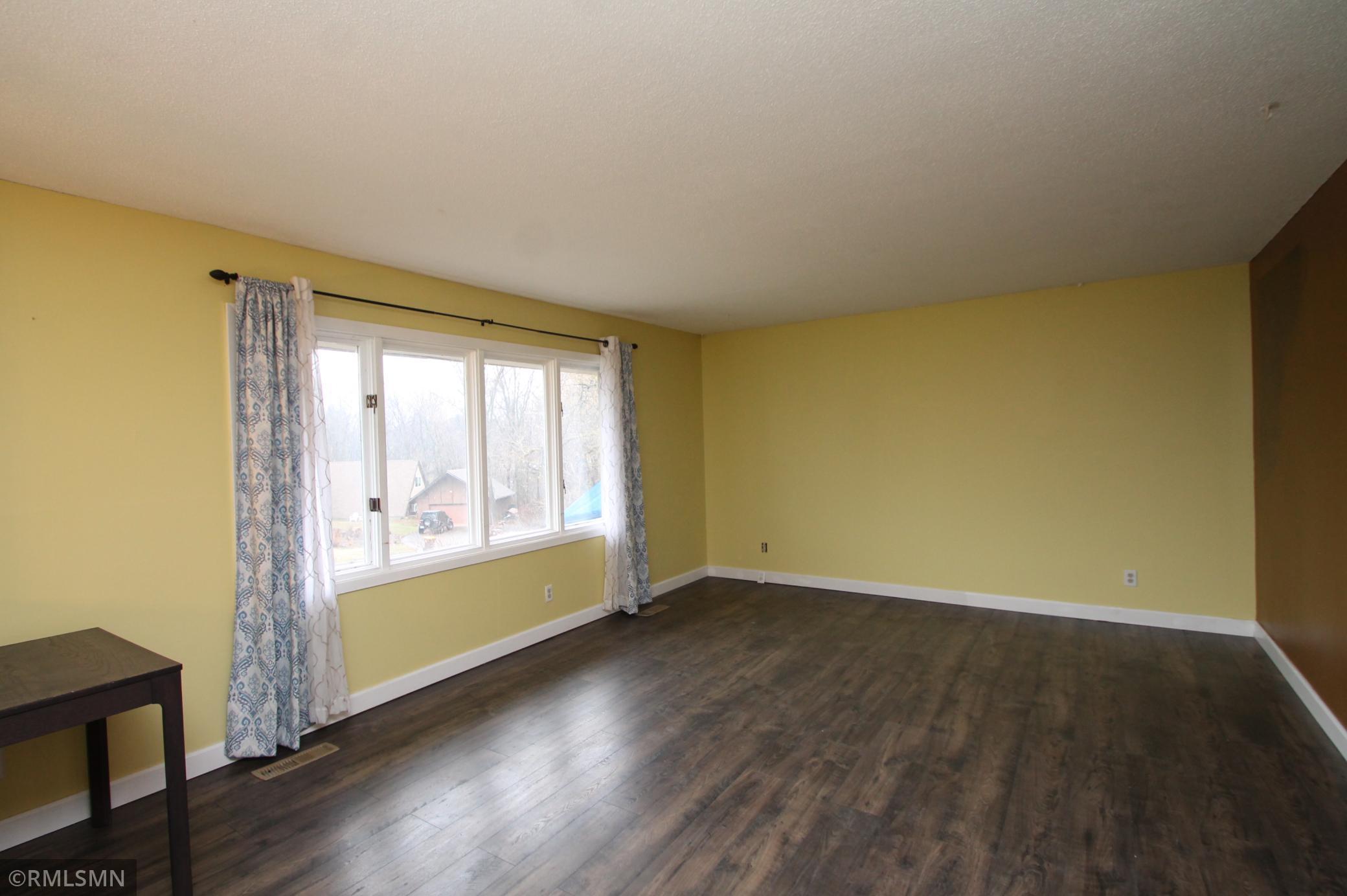 Living room with large picture window.
