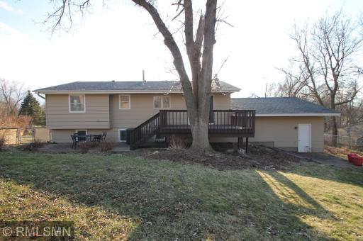 Back of home. You have 3 places to relax - 1 deck and 2 patios.