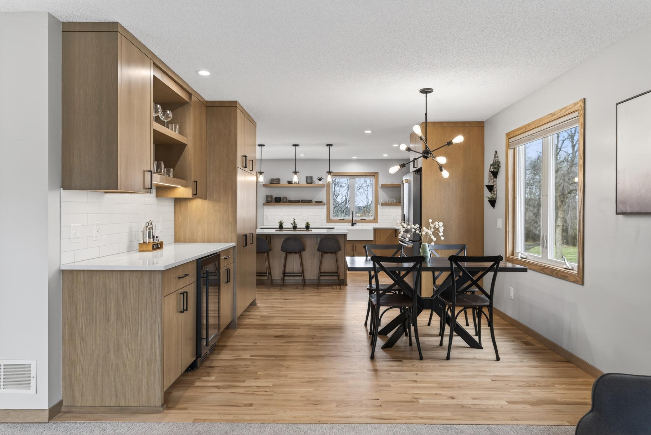 Formal dining area was reenvisioned with a new beverage station and additional cabinetry.
