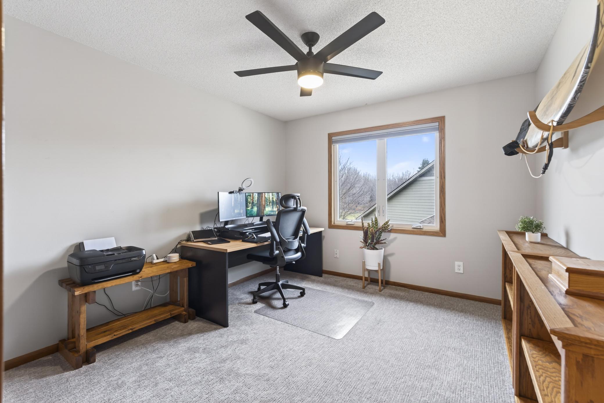 3rd upper level bedroom currently being used as a home office.
