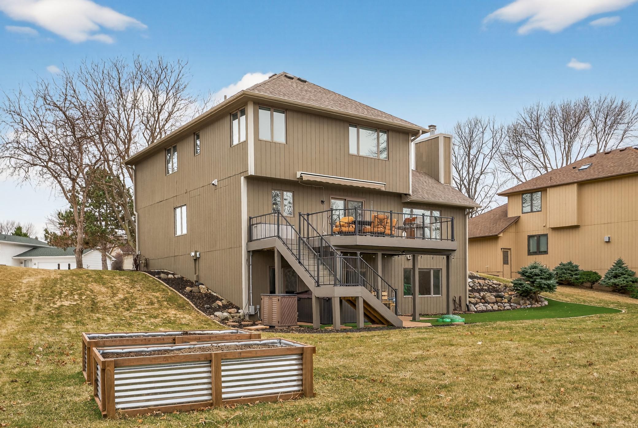 Raised garden beds in backyard.