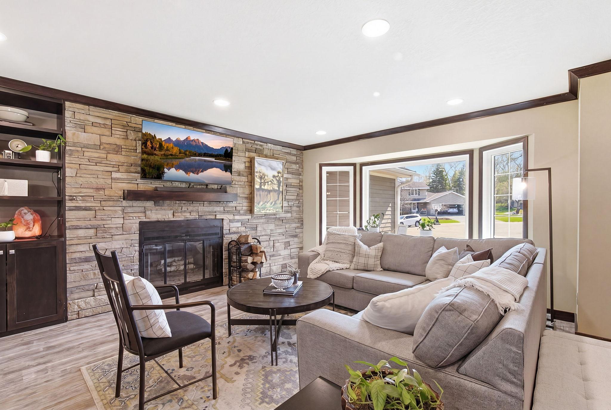 Living room with wood burning fireplace