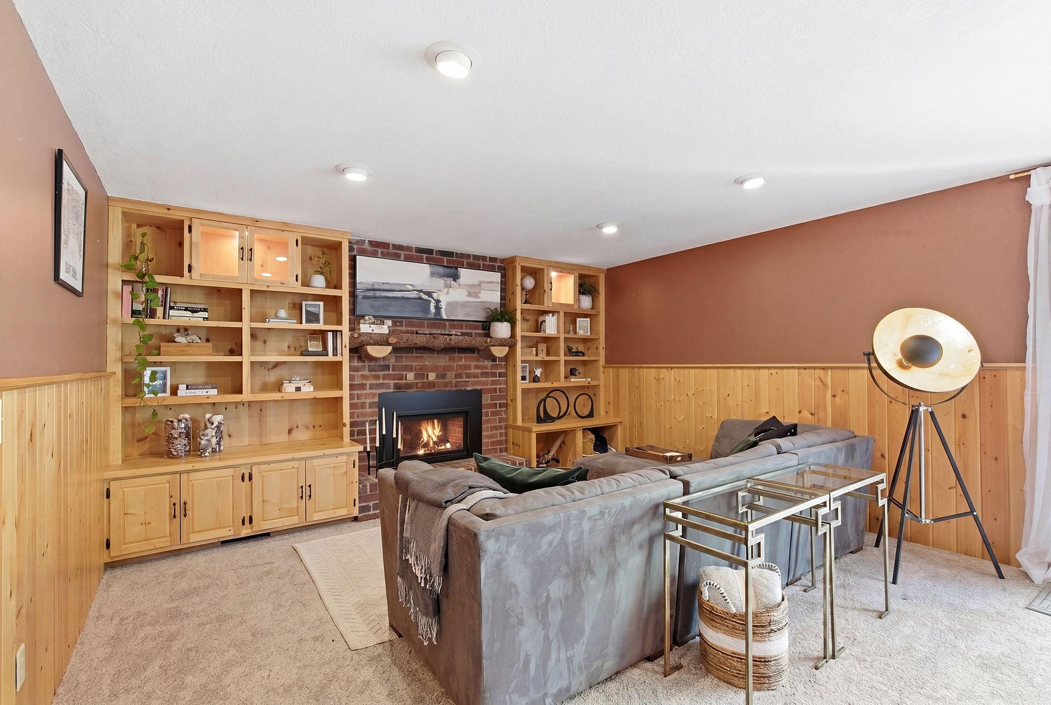 Lower level family room with gas fireplace