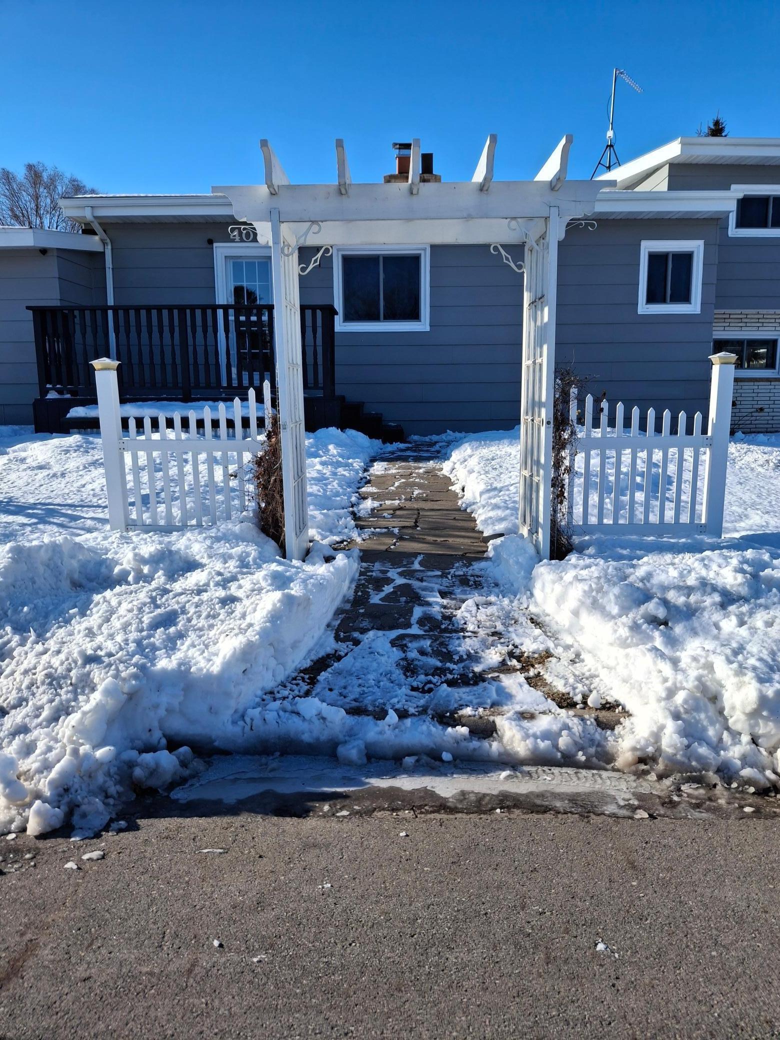 Arch and Sidewalk to Front Door