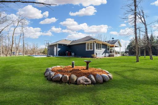 Let the kids roam freely in this spacious yard, offering plenty of room for play, exploration, and outdoor fun.