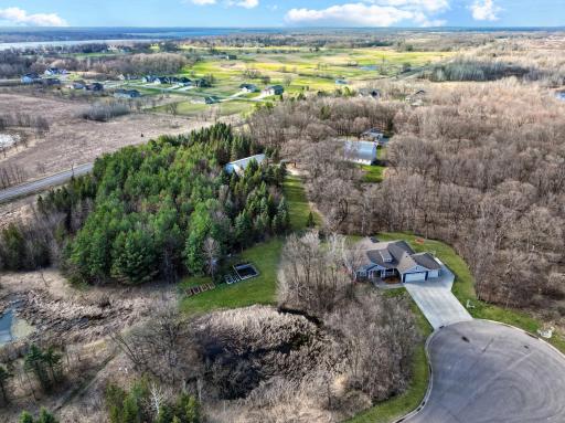 Close proximity to Geneva Golf Club, this home offers quick and convenient access to the golf club making it perfect for avid golfers and those who enjoy scenic recreation nearby.